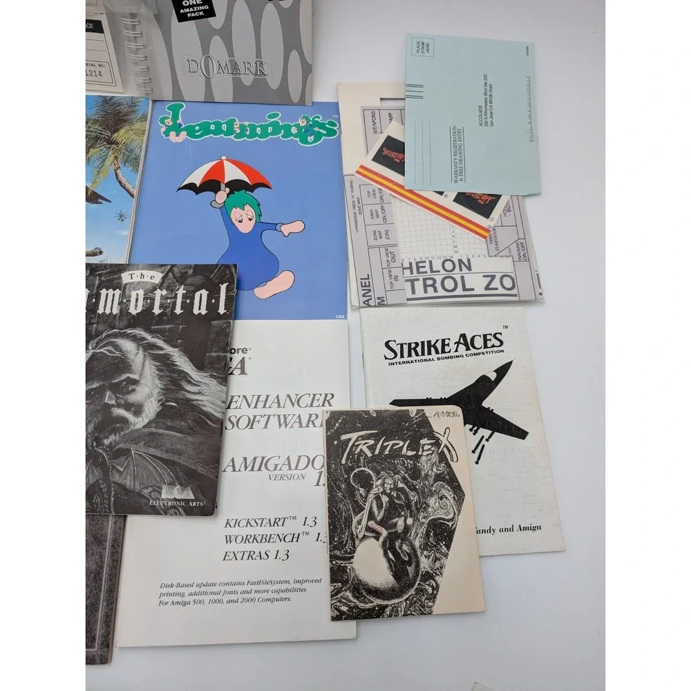 Commodore 64 Amiga Manuals Lot Immortal Lemmings Triple X Plus More